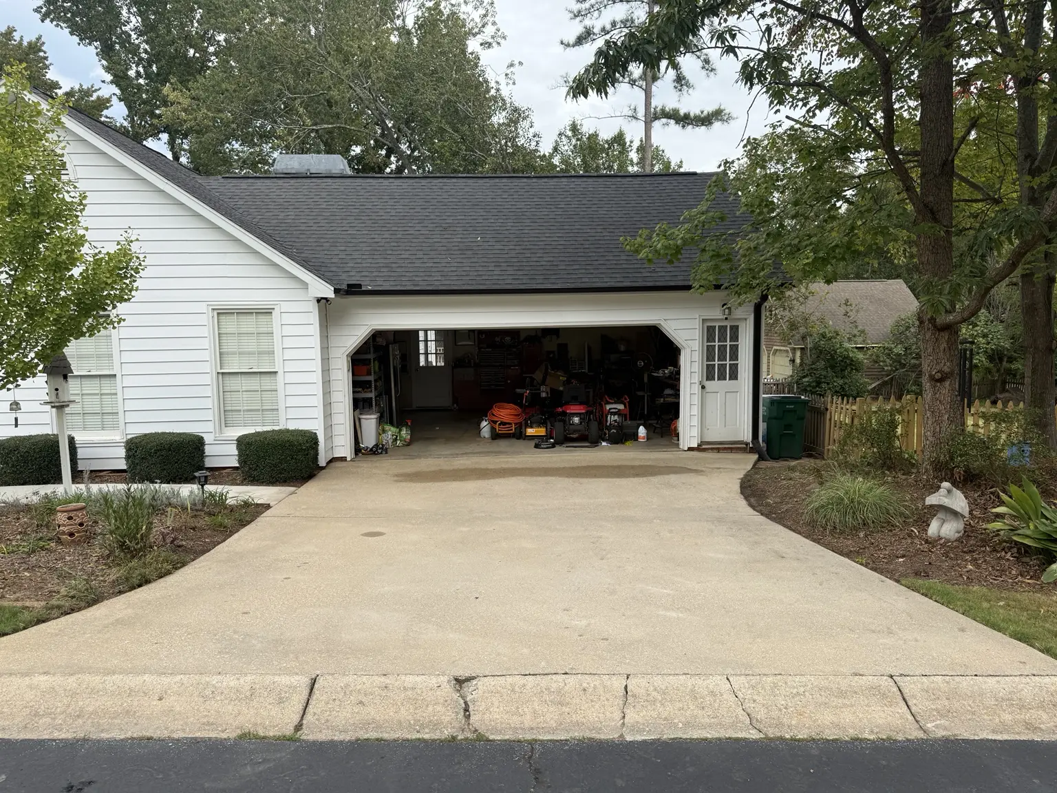 Clean concrete driveway after pressure washing